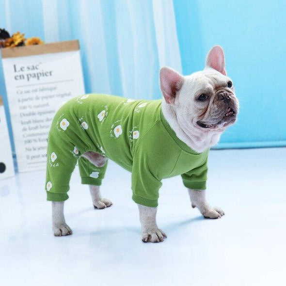 Cream French bulldog posing in green Sunny Side Up dog pajamas