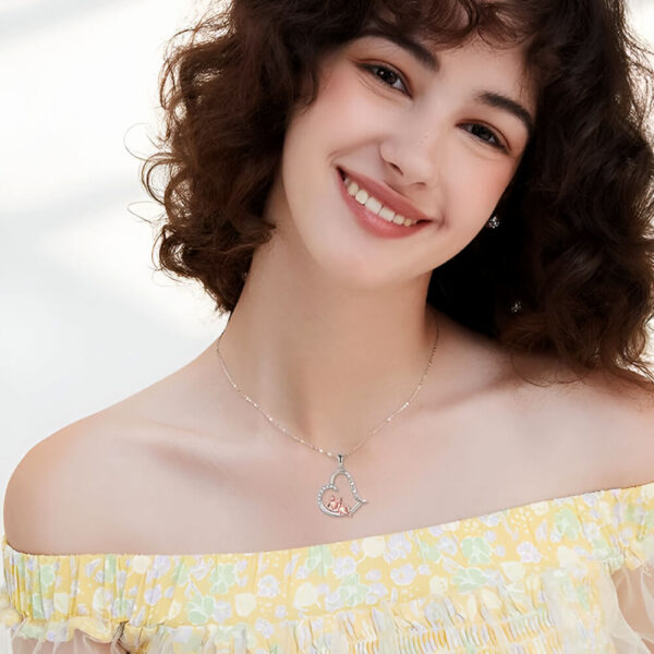 Close up portrait of a women model wearing Sleepy French Bulldog Silver Pendant